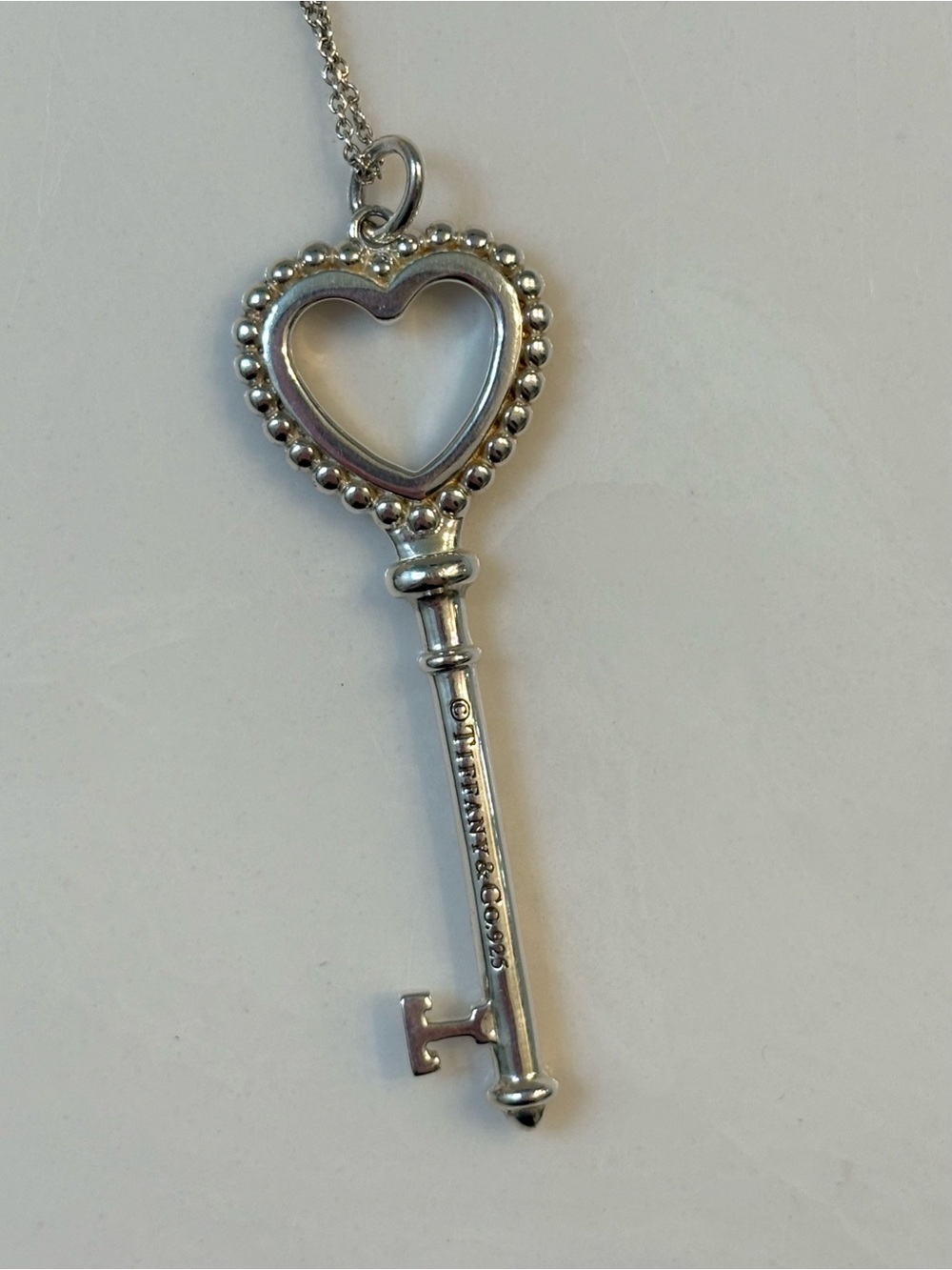 Tiffany & Co. enamel and sterling silver heart key pendant necklace with chain - Picture 6 of 9